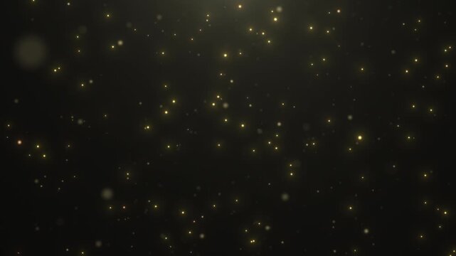 Golden glowing particles drift across a dark background, creating an elegant starfield effect with sparkle, depth, and a magical atmosphere.