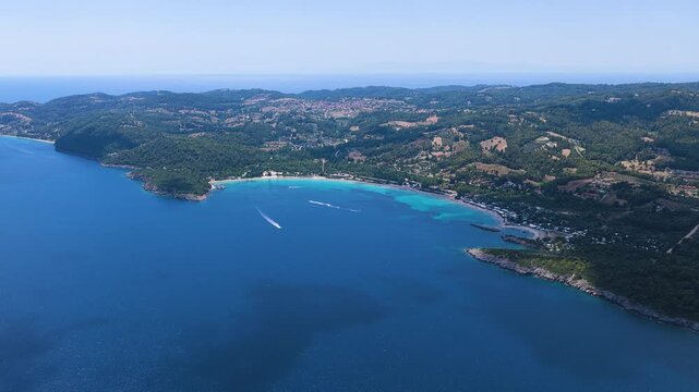 Golden Beach coastline surrounding a turquoise coastal bay
