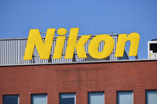 Nikon company office building with signage, logo on the facade. Popular Japanese photocameras producer. WARSAW, POLAND - APRIL 18, 2026