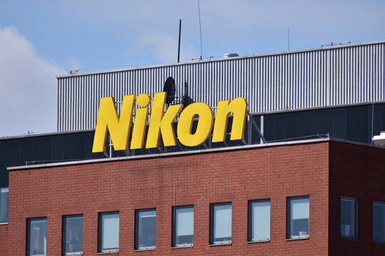 Nikon company office building with signage, logo on the facade. Popular Japanese photocameras producer. WARSAW, POLAND - APRIL 18, 2026