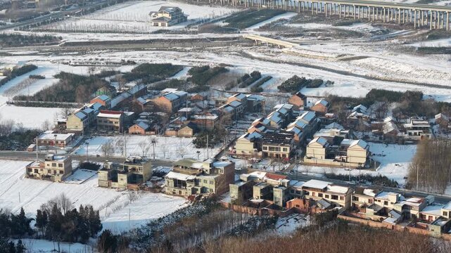 Snowy Chinese Village Aerial View With Bridge