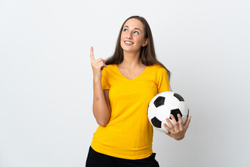 Young football player woman over isolated white background pointing up a great idea © luismolinero