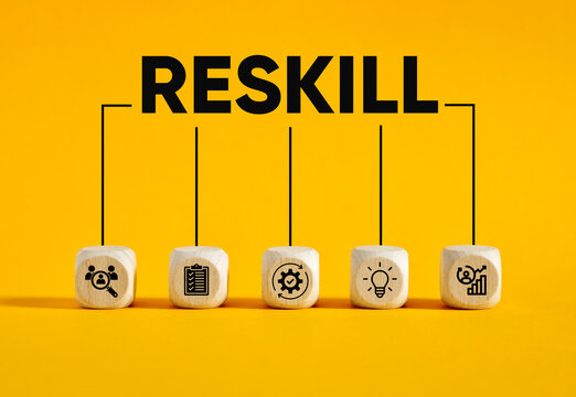 RESKILL word with business icons on wooden blocks