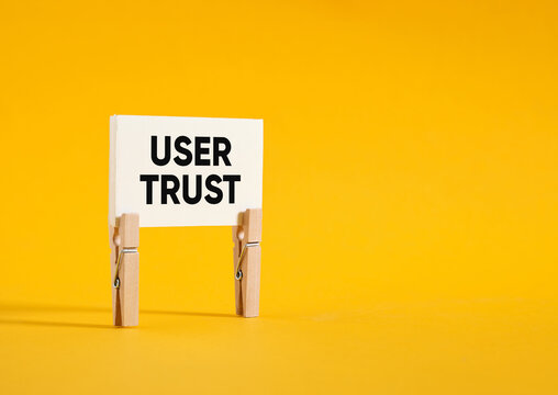 User trust concept on paper with yellow background