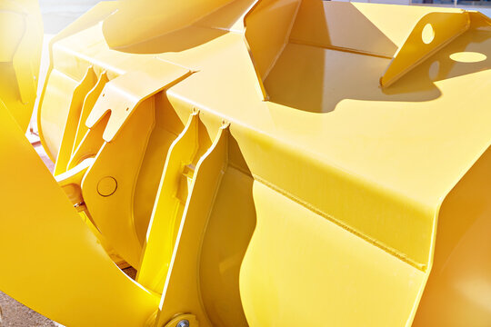 Yellow loader bucket