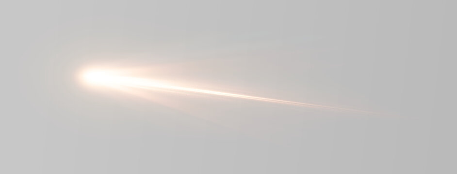 Comet light streak with radiant flare and sparkling particles.