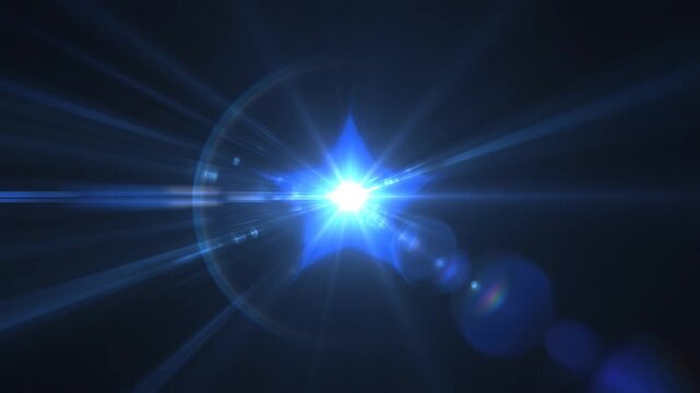 Blue lens flare expanding with radial light streaks during a dark cinematic zoom effect for sci-fi concepts