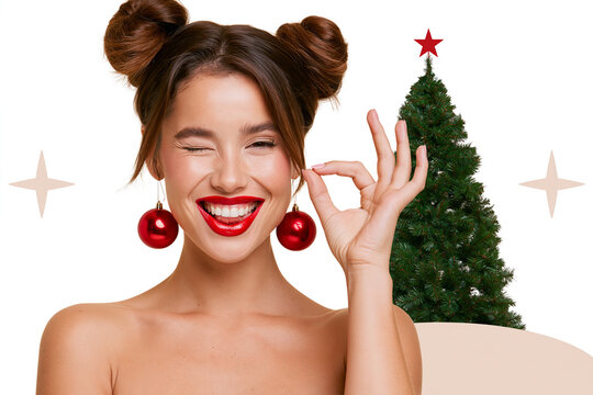  woman with her brown hair styled in two buns, winking and smiling broadly with bright red lipstick. 