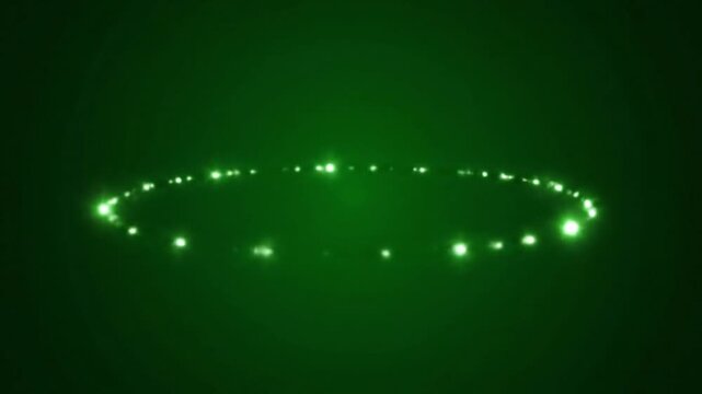 Glowing particle ring rotating on green screen background glowing points rotating circle abstract lights chroma key light particles glowing points rotating circle abstract lights chroma key light
