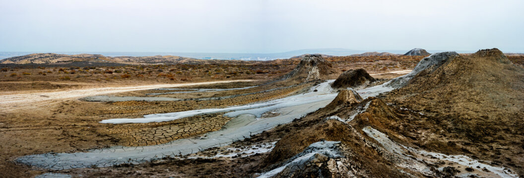 Bubbling Mud Volcanoes In Gobustan Azerbaijan And Panoramic Landscape