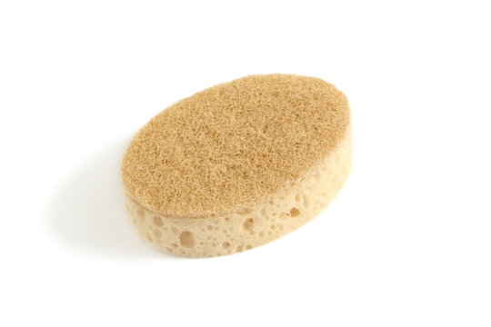 There is one dishwashing sponge lying on a white background.