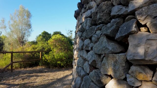 Ancient dry stone wall with natural stonework
