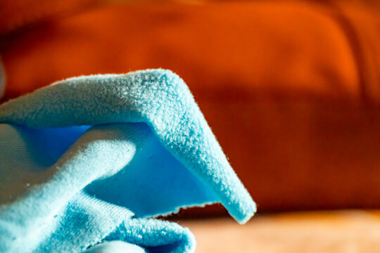 Soft blue fleece fabric texture close up showing cozy textile detail.
