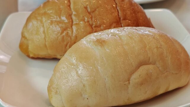 Fresh Salt Bread on a White Plate 