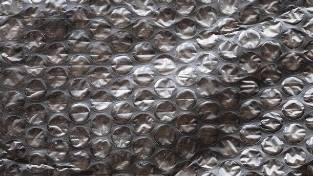 Black Bubble Wrap Texture Background for Packaging and Protection