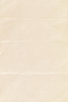 Soft cream paper sheet with visible horizontal and vertical fold lines forms a subtle wrinkled texture and neutral minimalist background.