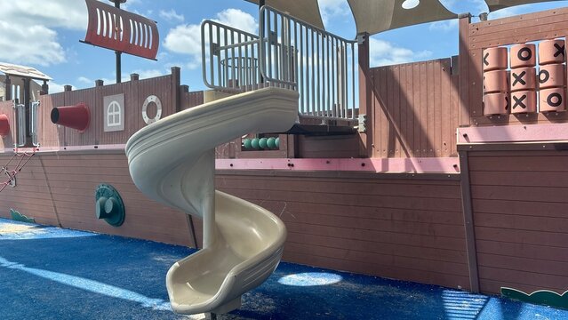 Pirate themed playground with a spiral slide, ship inspired structures and outdoor play equipment in Ashdod, Israel