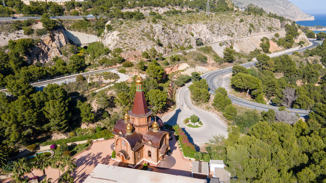 Altea Orthodox church building on winding mountain road