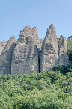 Puddingstone pinnacles at scenic Les Penitents geological formation near Les Mees, Provence, France