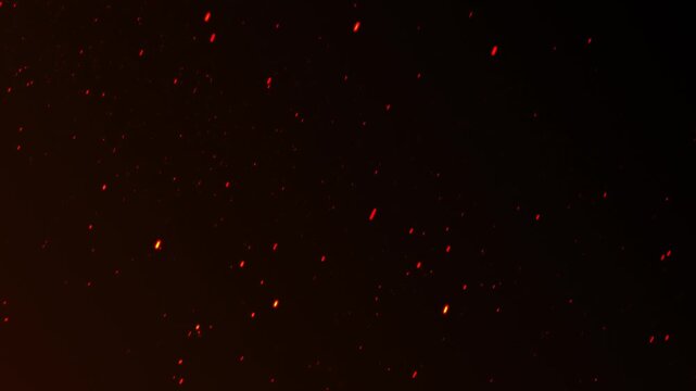 Fiery particles ascending gracefully against a dark background, warm effect