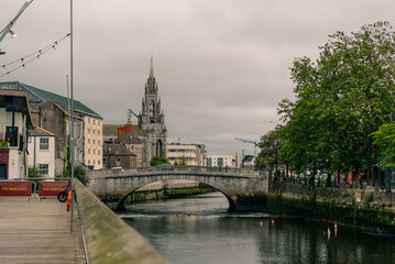 Obraz premium River Lee flowing through Cork, Ireland, with the cityscape along its banks - 4 September 2026.