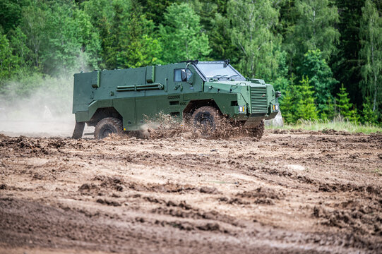 Armored Vehicle Crossing Muddy Terrain 