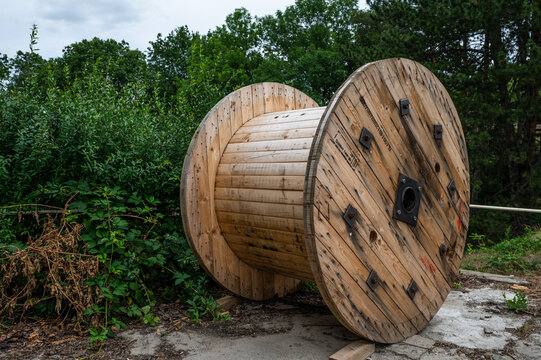 Large Wooden Cable Reel Stored Outdoors