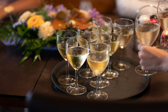 Glasses of Sparkling Wine on a Tray at a Celebration