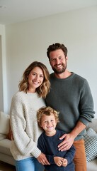 Fototapeta premium Happy family posing together in bright modern living room
