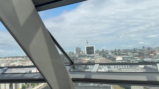 Berlin city panoramic view through the glass of Reichstag building dome. Popular excursion for tourists in the capital of Germany