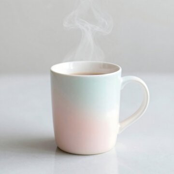 Steaming mug of beverage a pastel colored ceramic cup with rising vapor