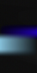 Dark abstract background, with a horizontal, soft blue light, glow effect against, a deep black, and charcoal grey, textured surface area © Tanzina