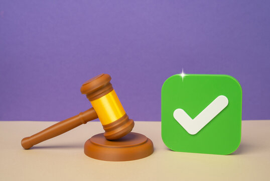 Judge's gavel and approval checkmark, positive court ruling outcome, lawsuit satisfaction. Successful legal decision, favorable judgment and justice achieved. Court approval, legal victory