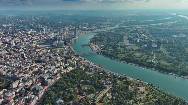 Aerial view of Belgrade with Sava and Danube rivers, historic fortress, urban skyline, bridges, parks, waterfront landscape in Serbia, 4k