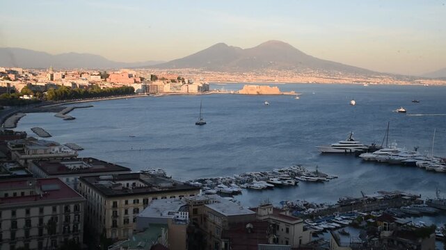 Scenic aerial view of naples bay with mount vesuvius volcano at sunset
