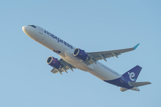 An HK Express Airbus A321neo (B-KKF) climbs steeply after takeoff showing its underside on October 19, 2024 in Fukuoka, Japan.