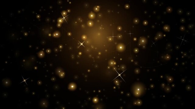 Golden sparkling particles on black background, shimmering gold dust bokeh, elegant luxury glitter stars for awards and celebration videos