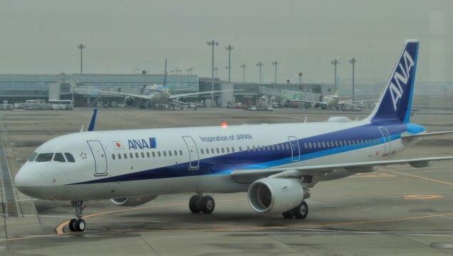 An All Nippon Airways (ANA) aircraft taxis on the ground in daylight on November 15, 2016 in Japan.