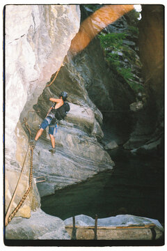 Climber Ascending  a Canyon