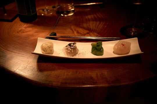 Delicate Dumpling Dish Served in a Restaurant at Night