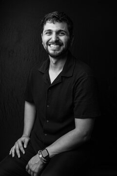 Smiling individual posing, expressing genuine happiness feeling joy
