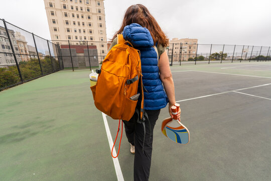sporty person walking with backpack fitness healthy lifestyle