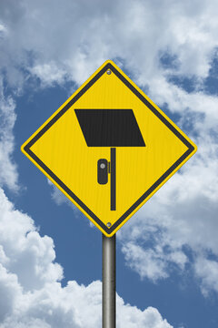 Surveillance camera icon yellow warning sign with sky for license plate reader LPR