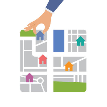 Human hand putting houses on the map, real estate business
