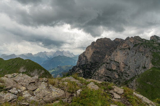 Mondeval, Italy. Dramatic Dolomite mountain landscape under storm clouds