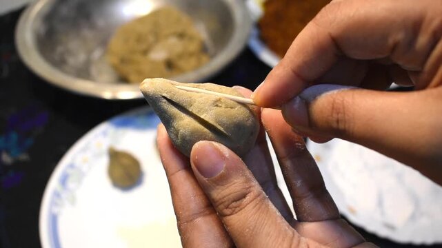 no mold modak design with hand.