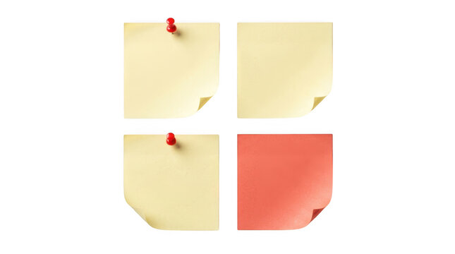 Set of yellow and pink sticky notes with red push pins for office reminders and messages