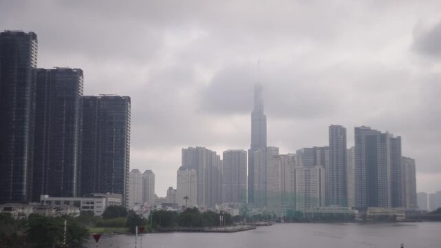 Landmark 81 Rising Through Low Clouds Over Ho Chi Minh City Skyline