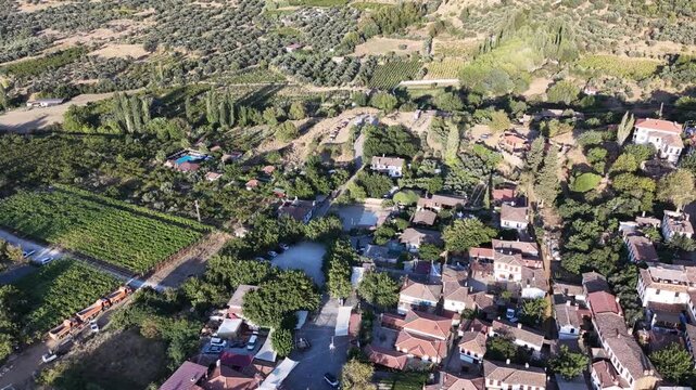 4K aerial video of Şirince village near Izmir, Turkey, showcasing its traditional houses, lush hills, narrow streets, and picturesque Mediterranean landscape.