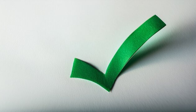 close up of green check mark on white paper
